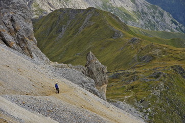 Fototapeta na wymiar Young woman hiking in the Dolomites