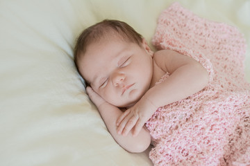 indoor portrait of adorable european newborn baby