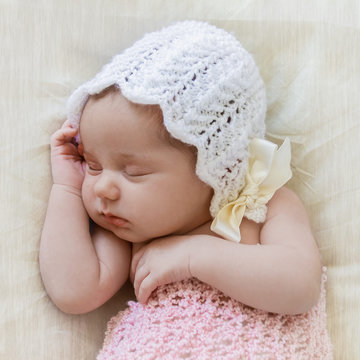 indoor portrait of adorable european newborn baby