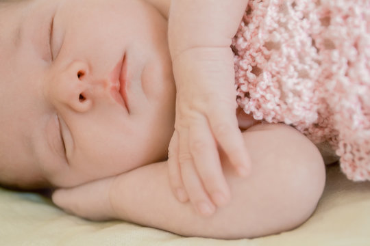 indoor portrait of adorable european newborn baby