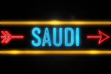 Obraz premium Saudi - fluorescent Neon Sign on brickwall Front view