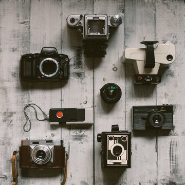 The Old Cameras on a White Board