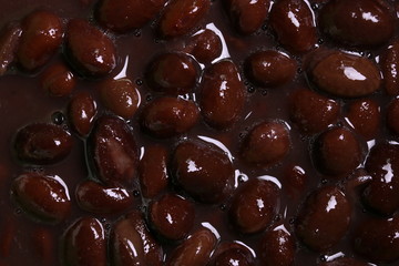 Background photograph of brown beans; texture and art