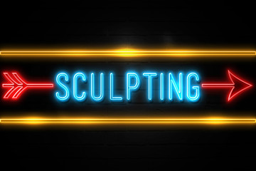 Sculpting  - fluorescent Neon Sign on brickwall Front view