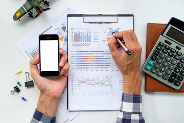 Businessman hands working on financial data