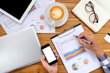 Businessman hands working on financial data