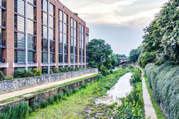 Georgetown neighborhood brick building in evening with dried up dirty C and O canal