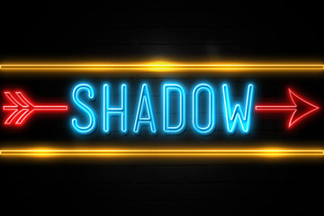 Shadow  - fluorescent Neon Sign on brickwall Front view