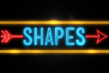 Shapes  - fluorescent Neon Sign on brickwall Front view