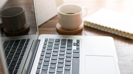 Home office desk with laptop computer