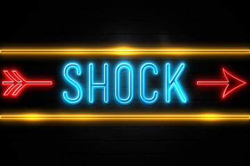 Shock  - fluorescent Neon Sign on brickwall Front view