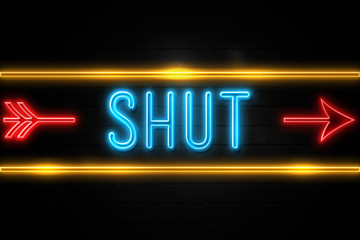 Fototapeta premium Shut - fluorescent Neon Sign on brickwall Front view