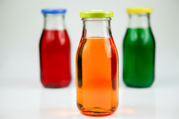 Fruit and vegetable juice bottles isolated on white background