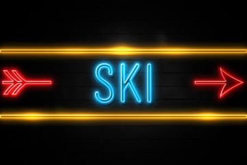 Obraz premium Ski - fluorescent Neon Sign on brickwall Front view