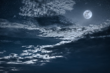 Night sky with bright full moon and dark cloud, serenity nature background.