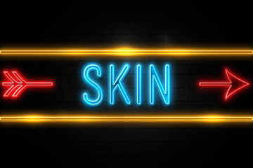 Skin  - fluorescent Neon Sign on brickwall Front view