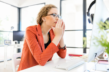 Young woman in office