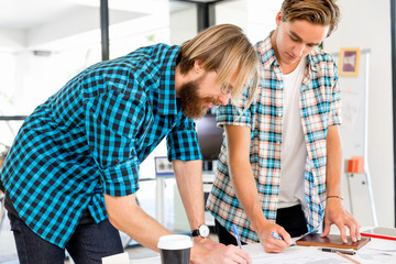 Two office workers at the desk