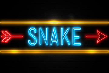 Snake  - fluorescent Neon Sign on brickwall Front view