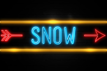 Snow  - fluorescent Neon Sign on brickwall Front view