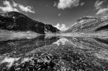Scenic fjord on Lofoten islands, Norway, Grotli and towering mountain peaks