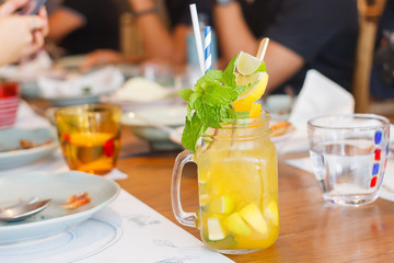 Orange Juice In Clear Glass / Orange Juice And Orange Slice In Clear Glass On Wooden Table.