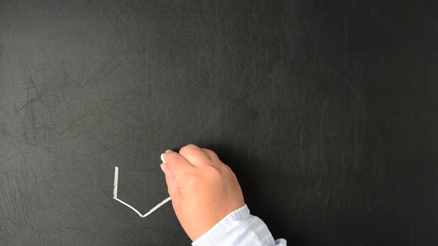 Drawing the chemical formula of Modafinil.	We write with chalk on a board.	