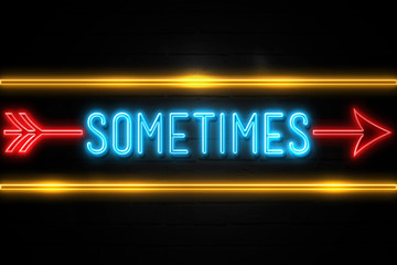 Obraz premium Sometimes - fluorescent Neon Sign on brickwall Front view