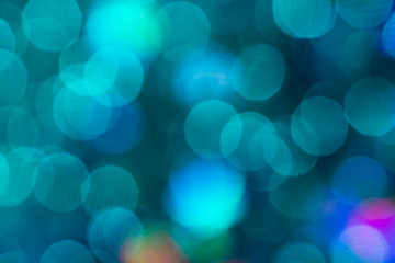 Colorful glitter abstract background with bokeh