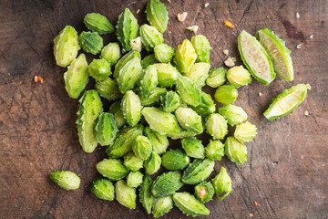 fresh Balsam Apple on old wooden table
