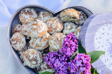 the tables with the desserts . decorated plates of cookies , biscuits. A wedding Banquet . Extra pounds and calories . Sweets of various kinds