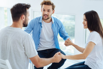 Fototapeta premium Pleasant nice people sitting in the circle