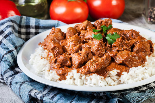 Chicken tikka masala served with rice