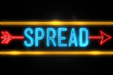 Spread  - fluorescent Neon Sign on brickwall Front view