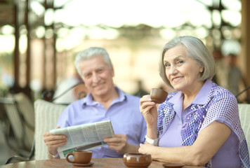 senior couple sitting at table