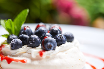 meringue dessert with fresh berries