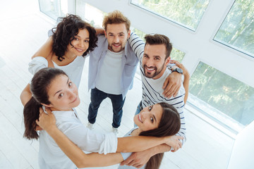 Fototapeta premium Happy delighted people looking at you