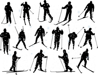 Naklejka premium set of fifteen skiers isolated on white