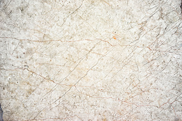 Naklejka premium Beige neutral cracked marble stone floor texture