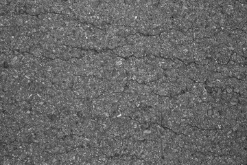 Asphalt background texture with some fine grain with road