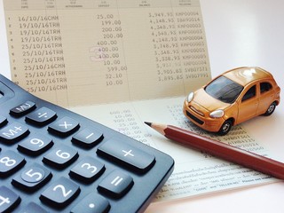 Business, finance, saving money, banking or car loan concept : Miniature car model, calculator and...