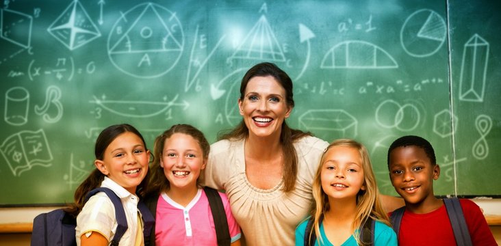 Portrait Of Teacher Posing With Her Pupils