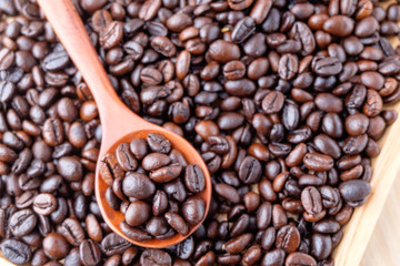 coffee beans on wooden background