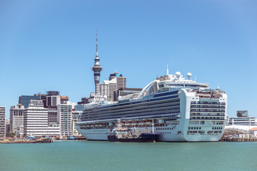 Auckland CBD skyscrapers and Sky Tower with a cruise ship in New Zealand, NZ
