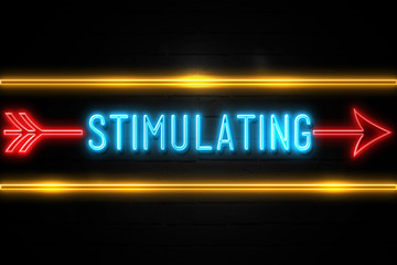 Stimulating  - fluorescent Neon Sign on brickwall Front view