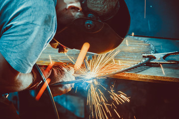 Welding Work. Erecting Technical Steel Industrial Steel Welder In Factory. Craftsman.