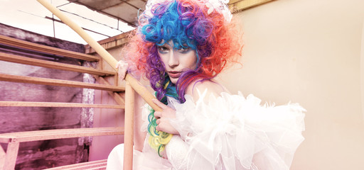 Portrait of a woman with a colored coiffure. Masquerade Ball