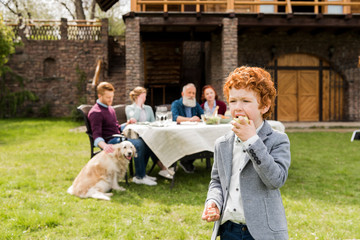 Boy eating apple