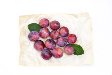 Plum food-paper on a white background.