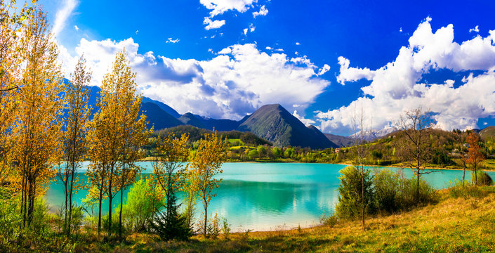 Beautiful autumn landscape with turquoise lake Lago di Castel San Vincenzo in Molise, Italy. Italian tourism
